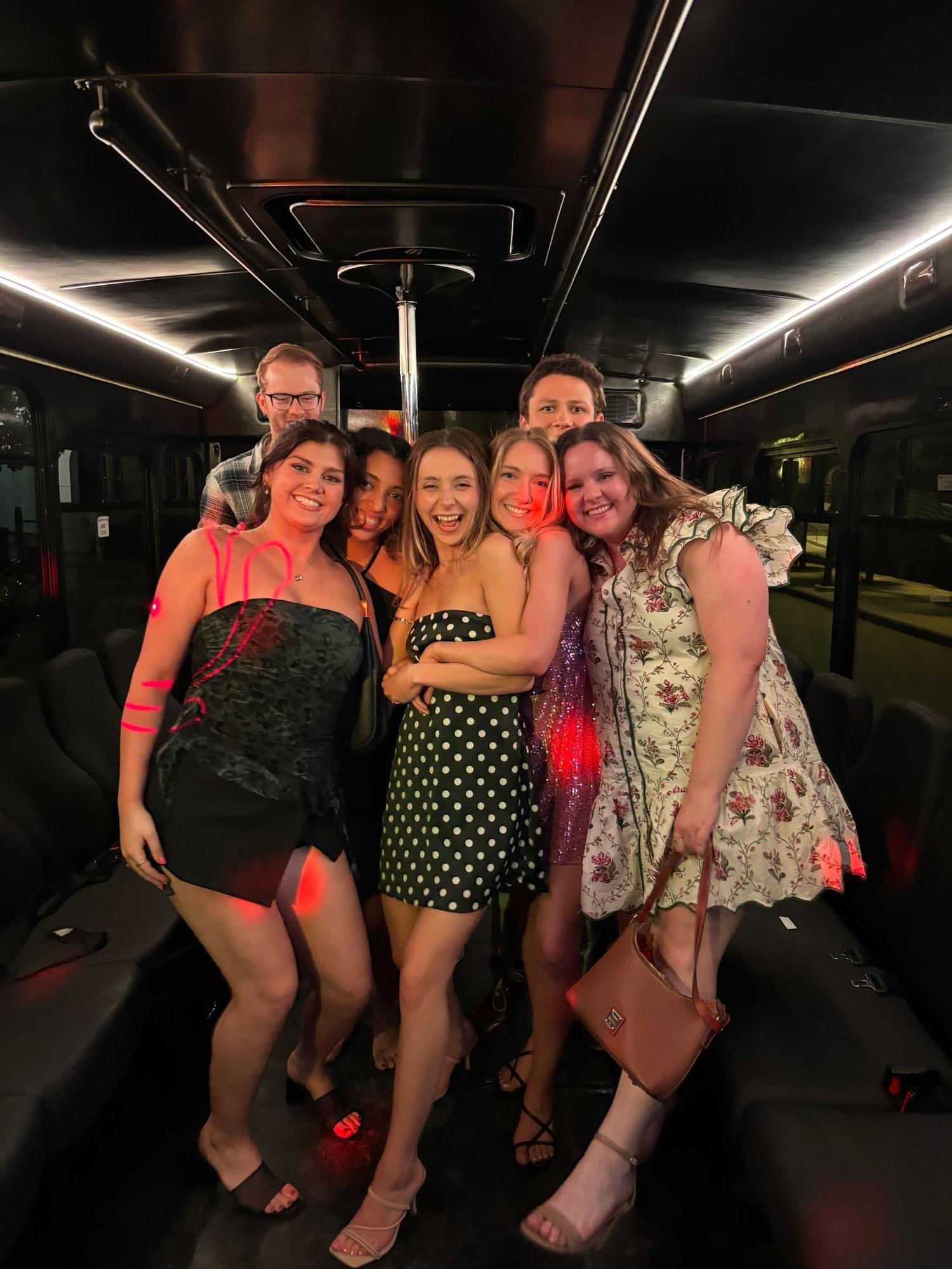 Group of riders on an AUX party bus